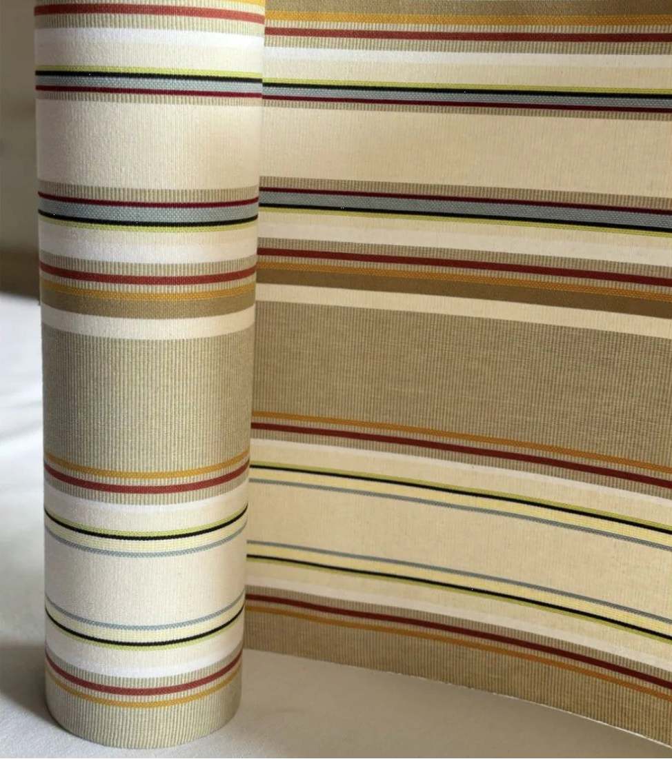 Striped cotton fabric roll featuring soft browns, beige, white, blue and yellows.