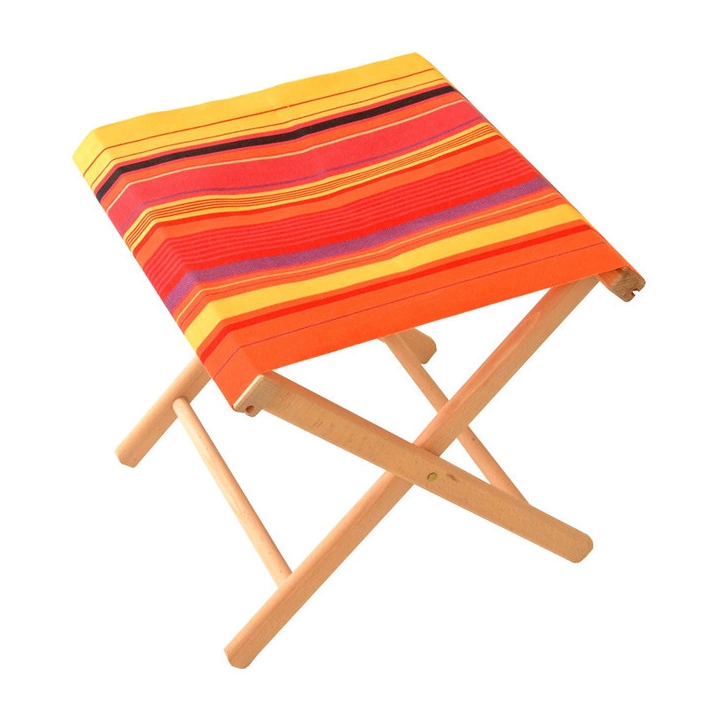 Folding stool showcasing a Petit Perpignan Rouge/Soleil fabric - featuring a striped pattern with various bands of vibrant warm shades. A detailed 100% cotton weave by By Les Toiles du Soleil