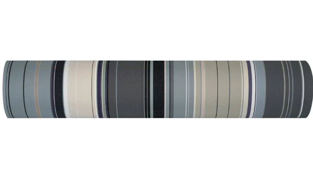 100% cotton Les Toiles du Soleil fabric roll of Rue du Bac Gris - a multi striped woven pattern of different shades of greys, blues and beige