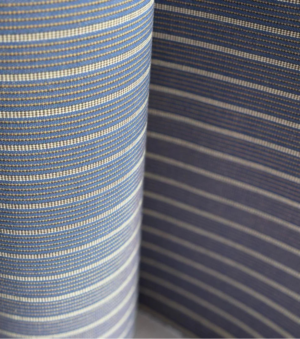 Close up of 1897 no.9 43cm cotton fabric by Les Toiles du Soleil. Featuring blue and light stripes with detailed weave by Les Toiles du Soleil