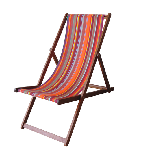ici et la hardwood deckchair with colourful striped cotton fabric with vertical red, orange, and multicoloured stripes on a white background