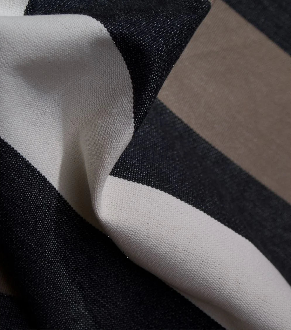 Close up of Boulevard Raspail Taupe 100% cotton Les Toiles du Soleil 180cm with black, brown and neutral multi striped 