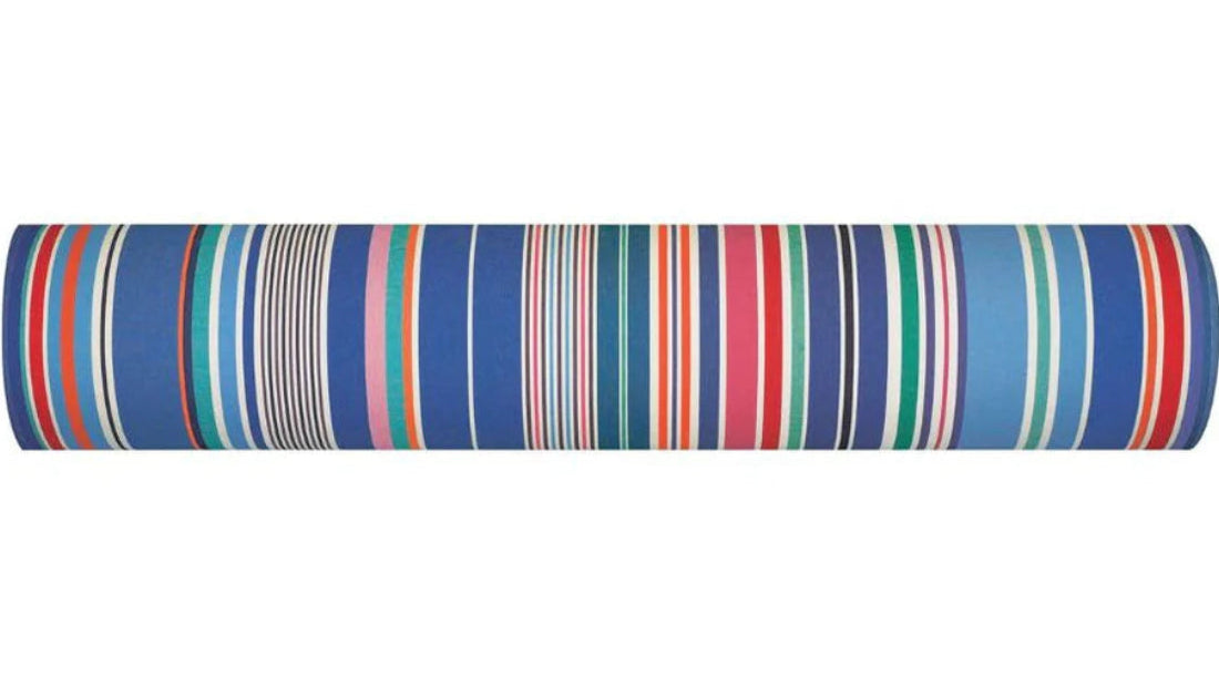 A cotton fabric roll of Aigue Marine, which is a multi coloured striped fabric made by Les toiles du Soleil. It showcases a variety of shades of blue, pink, red turquoise, greens and other vibrant colours