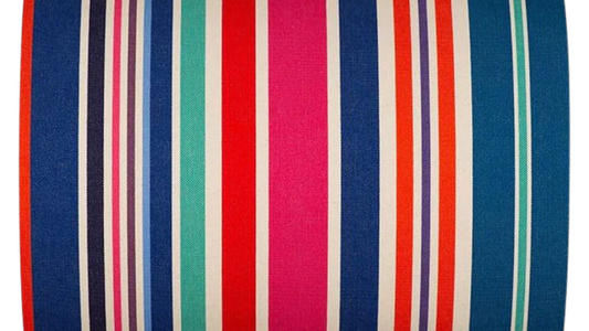 Cotton roll featuring bold stripes of navy, red, fuchsia, orange, teal, green, cream and purple, with a fine orange selvedge edge.
