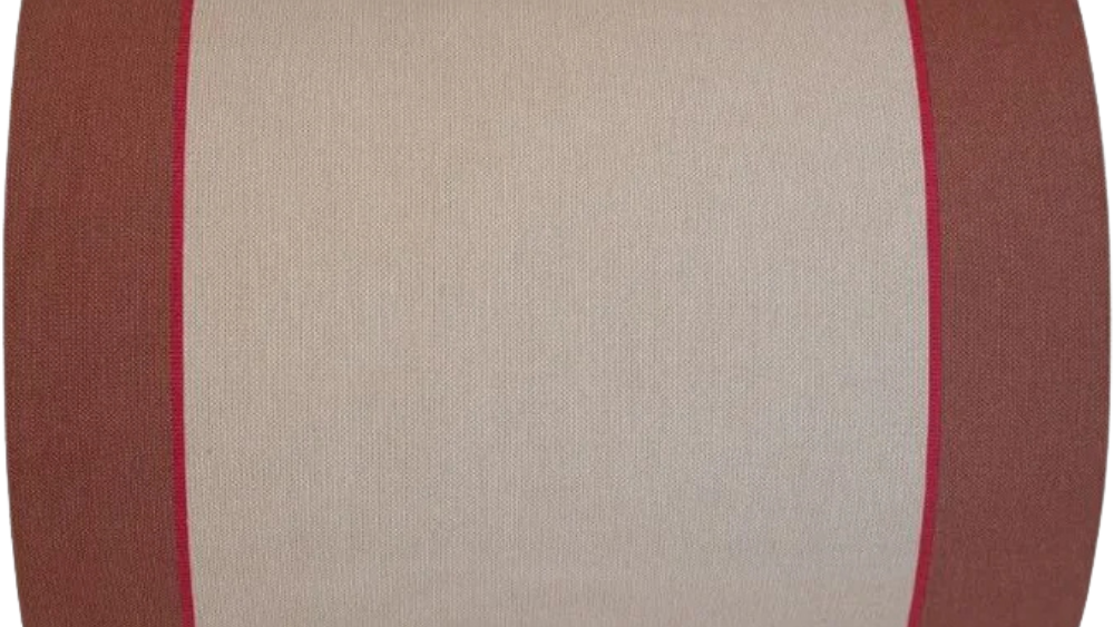 Close-up of a rolled cotton fabric featuring a wide warm écru centre stripe flanked by broad terracotta bands, with a fine crimson accent line between them.