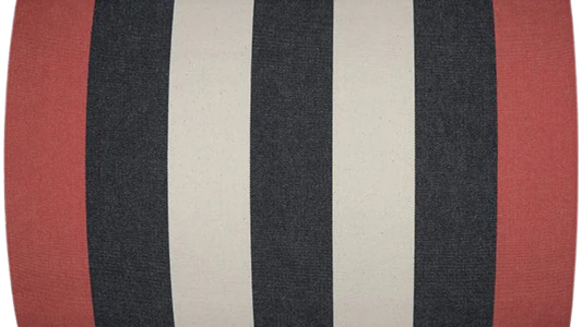Fabric roll of Bold black and ecru/beige stripes in-between red edges