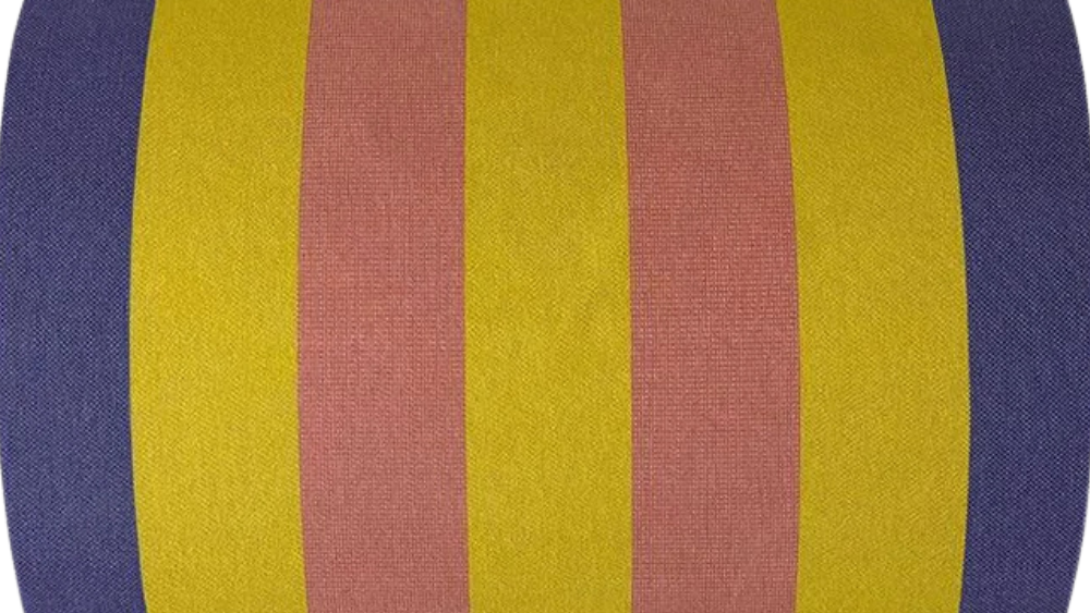 Carthage Jaune Rode is fabric roll featuring a striped pattern with vibrant yellow, rose and klein blue. A detailed 100% cotton weave by By Les Toiles du Soleil
