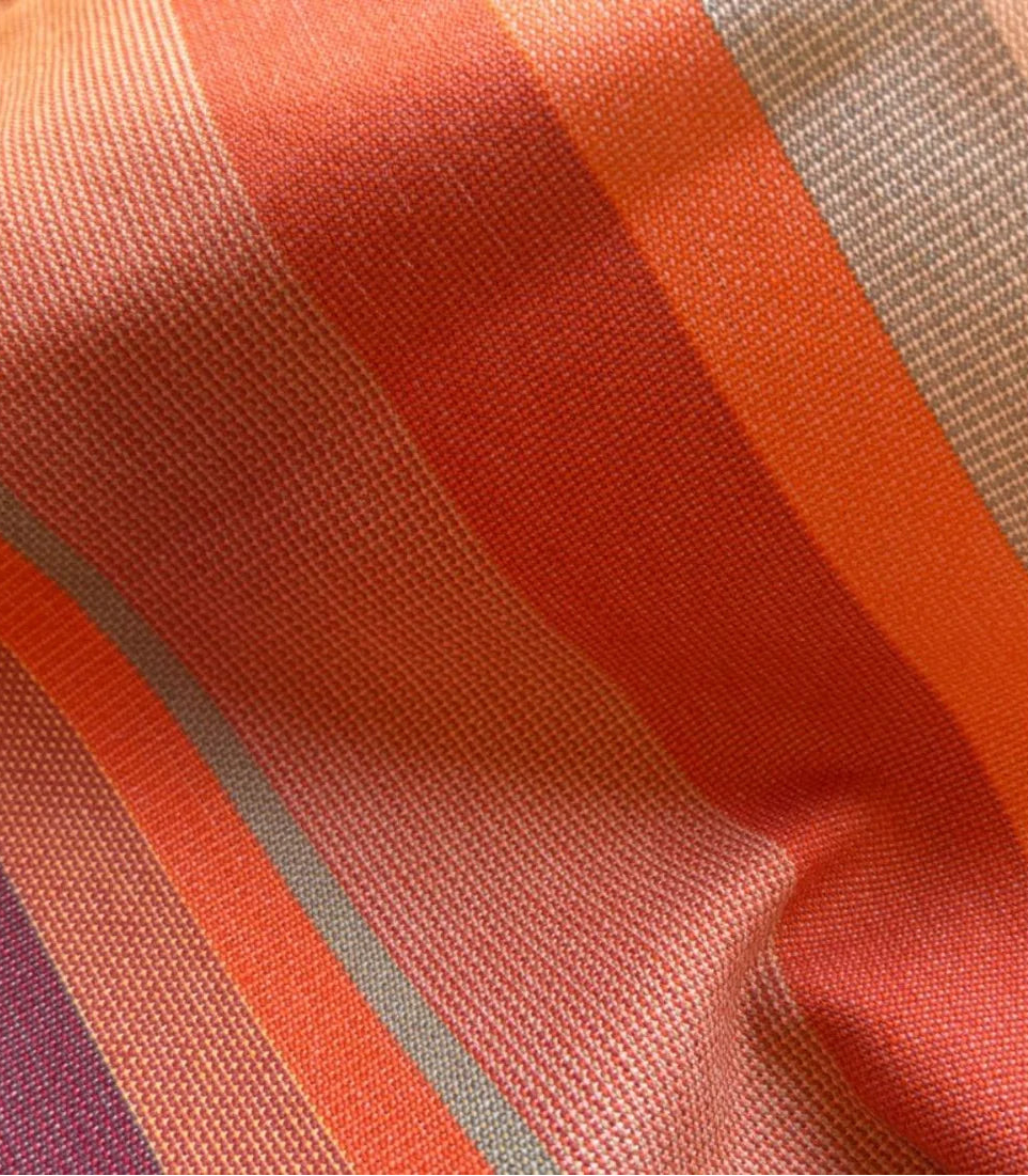 Les Toiles du Soleil 100% cotton fabric Crayou. Multi terracotta coloured striped fabric close up