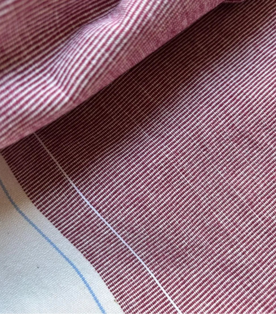 Les Toiles du Soleil Charlotte Tomette fabric of sweet terracotta, lavender blue and cream stripes 100% cotton fabric roll close up