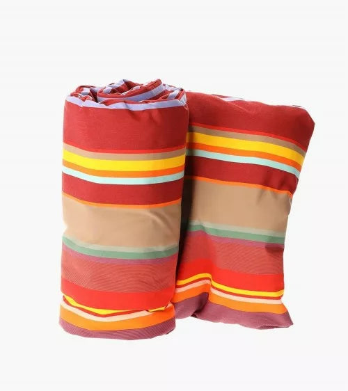 Les Toiles du Soleil exterior sun lounge mattress. Made in Sunbrella Collioure Rouge multi striped fabric, with a white background.