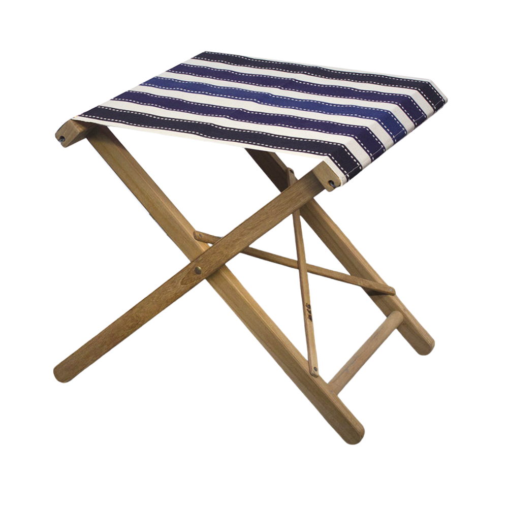 A folding teak stool with a striped cotton canvas seat and backrest in a French blue and white colour scheme.