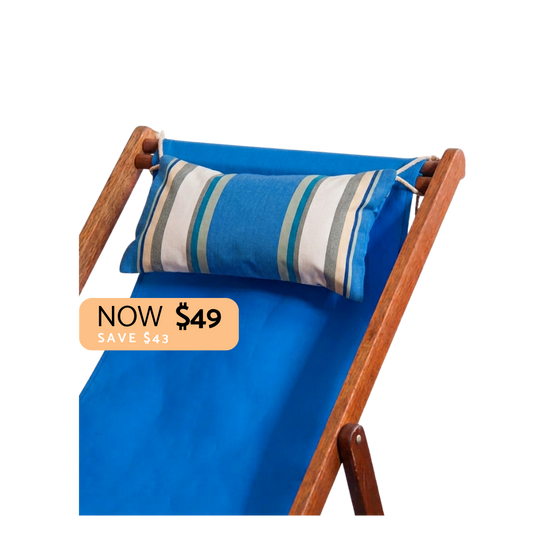 Blue, white green and grey striped head cushion on a blue deckchair. Plain background