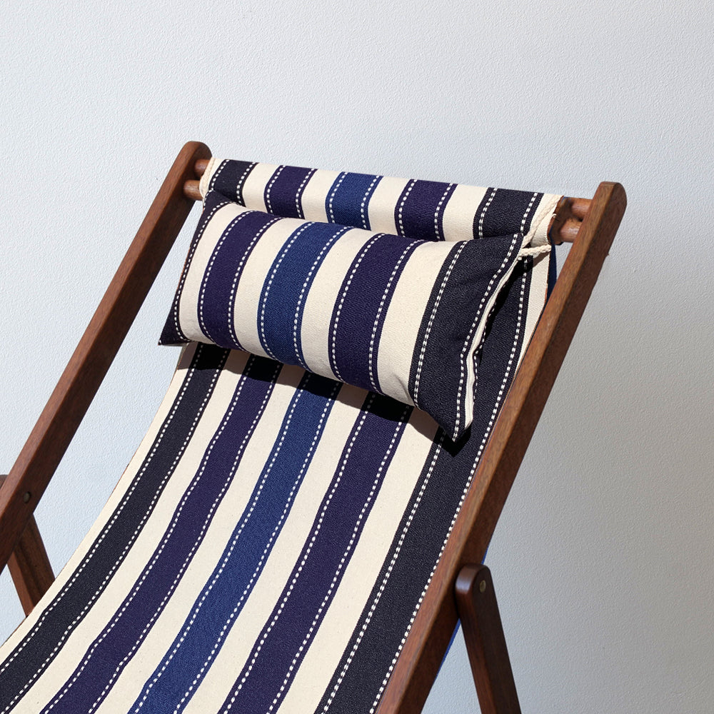 ici et la deckchair with head pillow made from Petit Sellier. A fabric featuring a striped pattern with various bands in different shades of blue. A detailed 100% cotton weave by by Les Toiles du Soleil