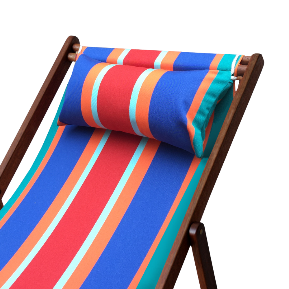 close up of hardwod deckchair with matching head pillow featuring Les Planches Les Toiles du soliel outdoor Sunbrella fabric. Multi striped with blue, red, orange and teal. On a white background