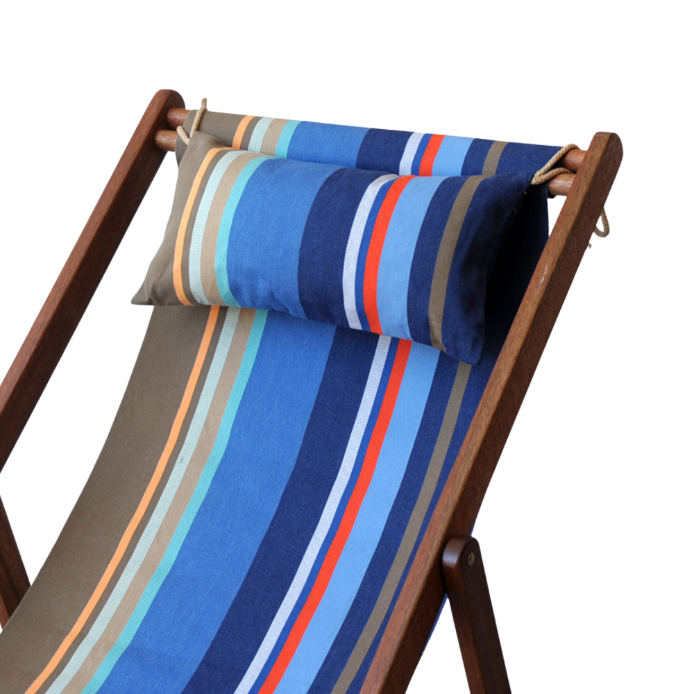 A striped fabric deck chair cushion set with a matching headrest pillow, shown on a wooden folding chair against a plain white background. Sling colours featuring Multicoloured striped fabric different shades of blue and a red, brown, and yellow stripe