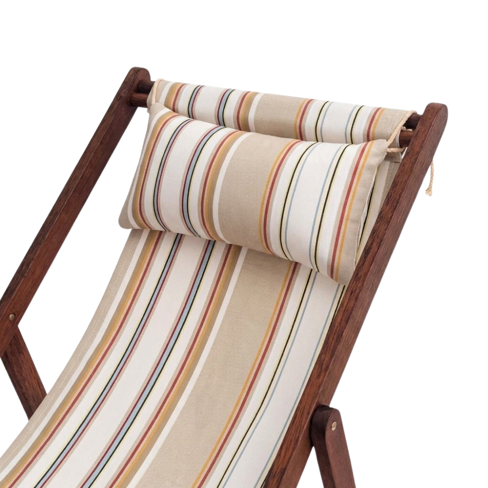 Head pillow on a fabric deckchair. Featuring natural, beige, cream, and other warm tone stripes. 