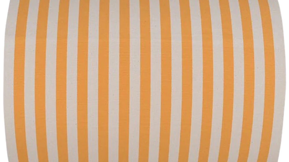 Isola Bella is a 43cm fabric cotton roll made by Les Toiles do Soleil. It is striped in saffron yellow and off white.