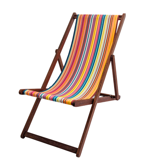 Hardwood folding deckchair from ici et la with multicoloured striped waterproof sunbrella fabric