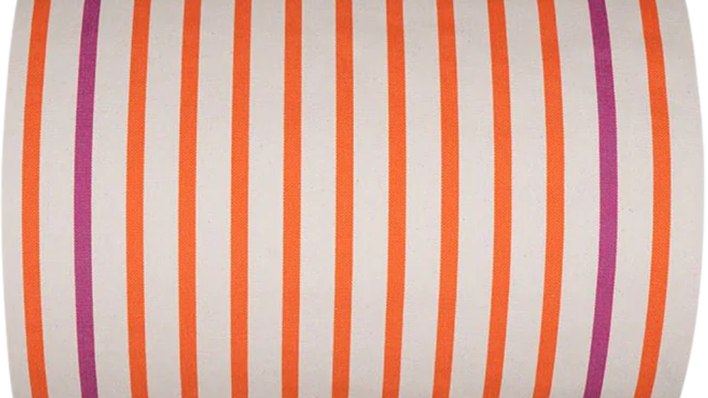 Vibrant thin sailor stripes of orange and fuchsia on a 43cm 100% cotton fabric roll by Les Toiles du Soleil