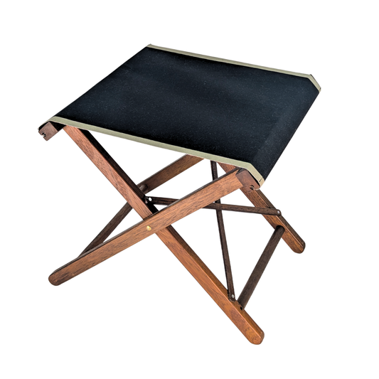 Hardwood folding stool with cottonLes Toiles du Soleil fabric in 43cm featuring black with taupe coloured edges. On white background