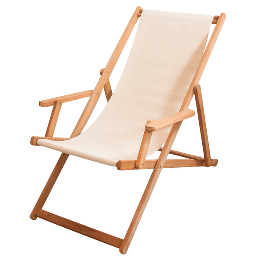 Featuring Oxford a beige natural coloured cotton fabric by Les Toiles du Soleil on a teak deckchair with arms deckchair. Shown in a reclined position on a white background