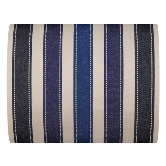 A fabric thumbnail featuring a striped pattern with various bands in different shades of blue. A detailed 100% cotton weave by by Les Toiles du Soleil