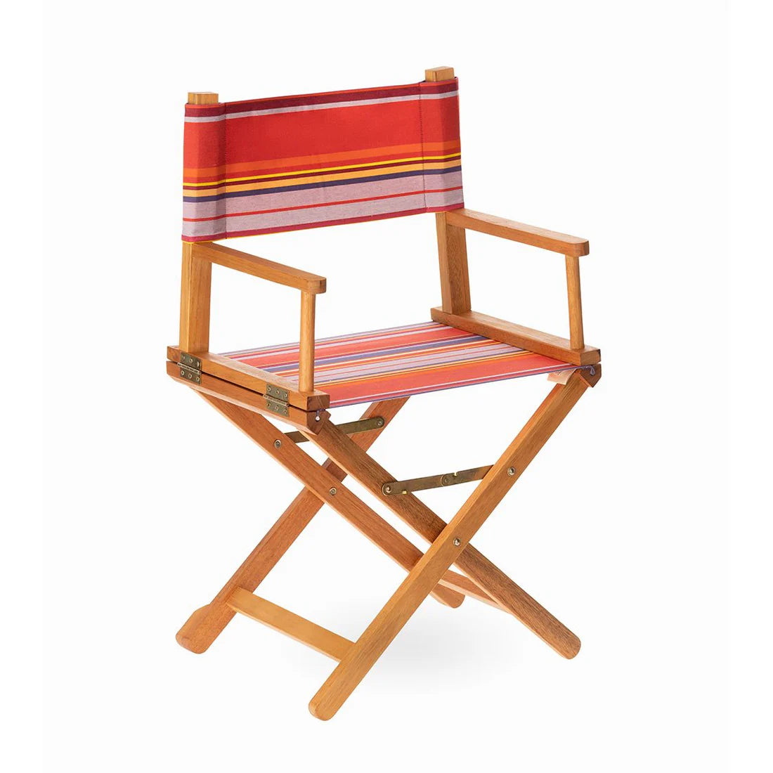 Wooden directors chair with colourful multi-striped cotton fabric. Showcasing vibrant pinks, lavender, purple, yellow, and orange. Petit Sixtine is a fabric made by Les Toiles do Soleil. White background