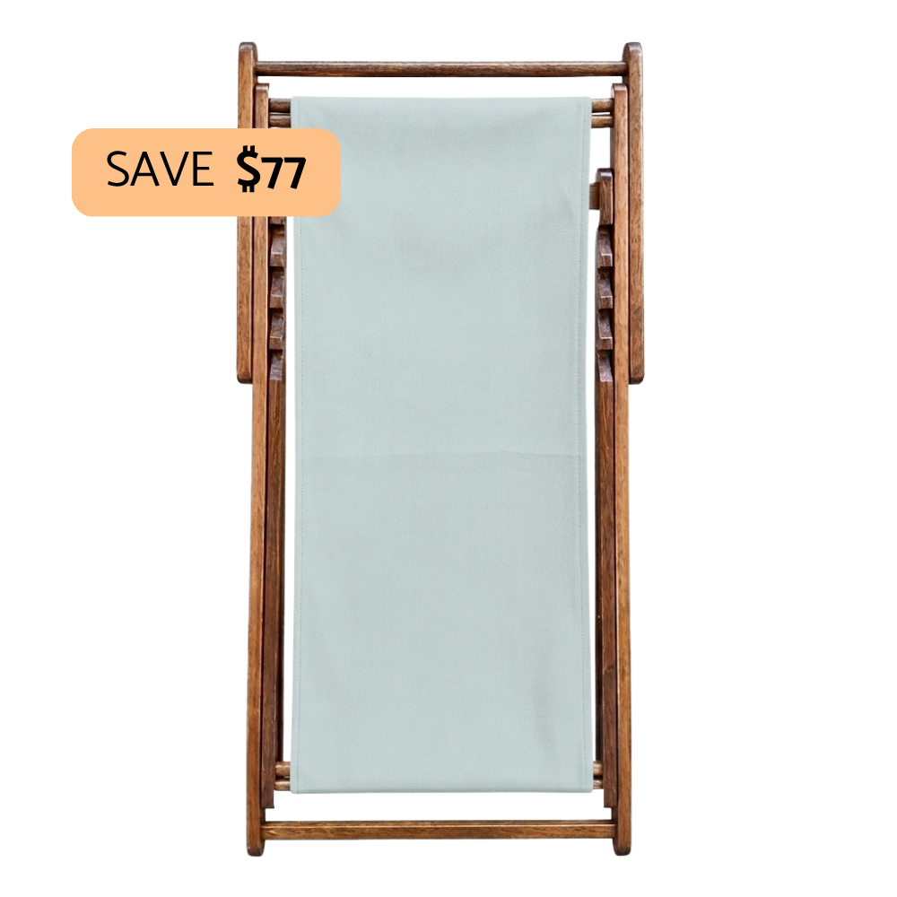 A wooden folding beach chair with a light grey fabric sling, shown on a plain white background with a promotional orange badge that reads 'SAVE $77'.