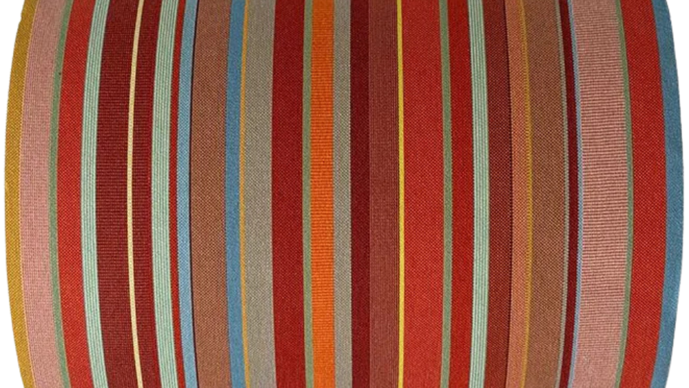 100% cotton 43cm fabric roll of Pézilla-la-Rivière, this fabric reflects the warm tones of stone, terracotta, weathered shutters, and sunlit rooftops. A les toiles du soleil woven fabric product