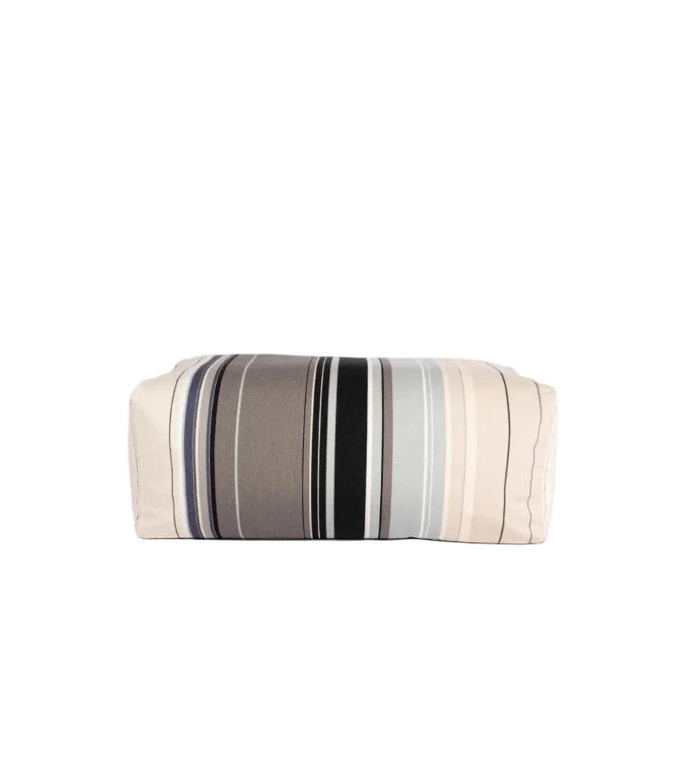 Pouf made from 100% cotton Les Toiles du Soleil fabric roll of Rue du Bac Gris - a multi striped woven pattern of different shades of greys, blues and beige