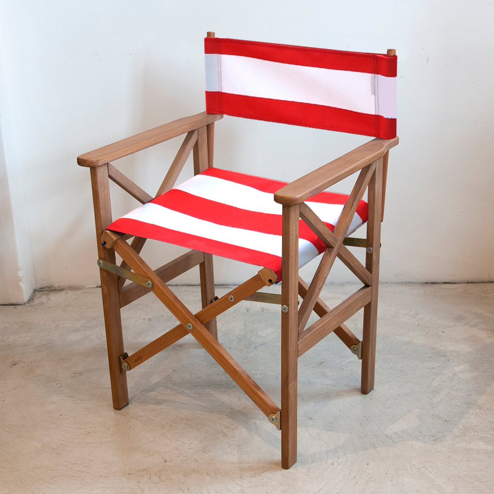 Ici et la foldable directors chair with Sunbrella read and white striped fabric