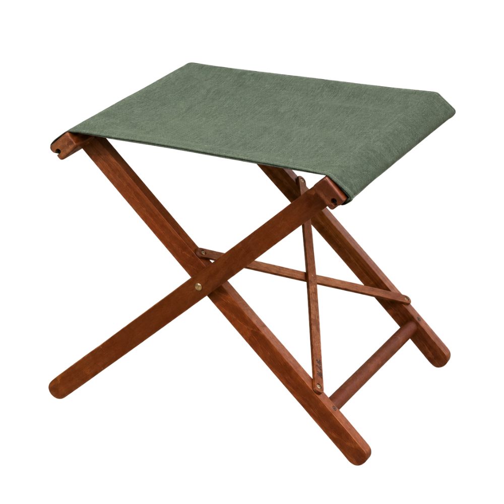 Sage chilé sunbrella fabric sling on hardwood folding stool. One a plain background