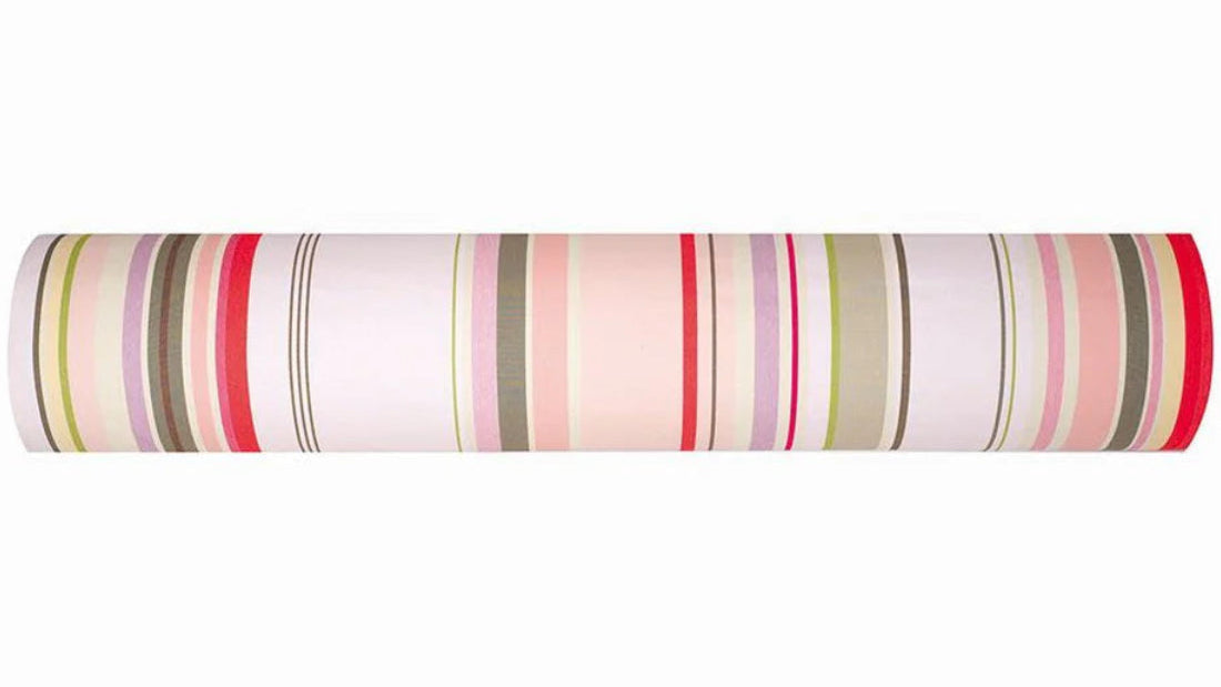 Sakura striped Les Toiles du Soleil 100% cotton fabric roll. Soft tones of white, beige, and blush pink reflect the gentle arrival of spring.