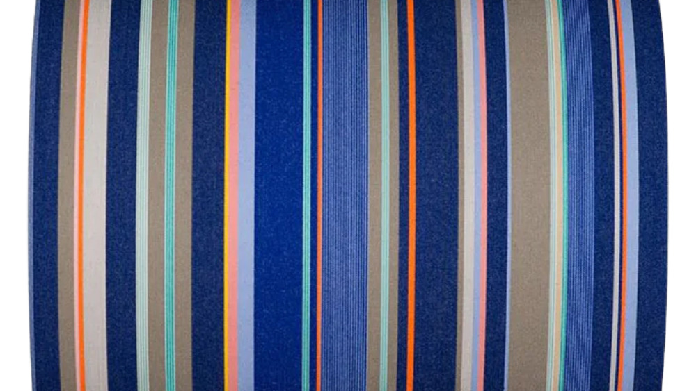 Multicoloured striped fabric featuring shades of blue, grey, orange, pink in different sized stripes