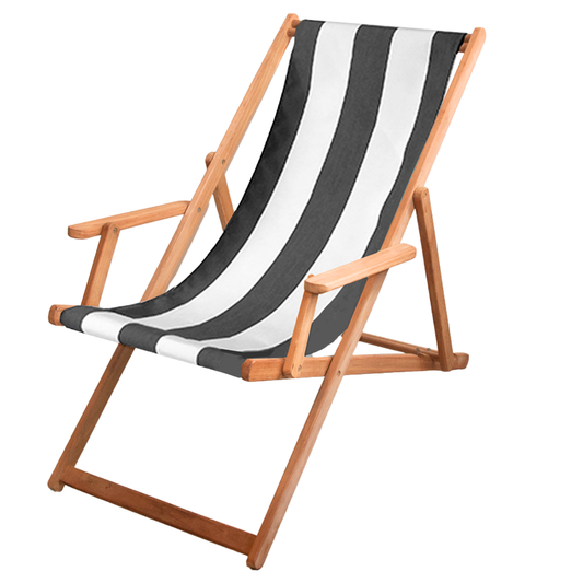 A teak folding deck chair with a charcoal and white striped fabric sling seat and backrest, shown on a plain white background.