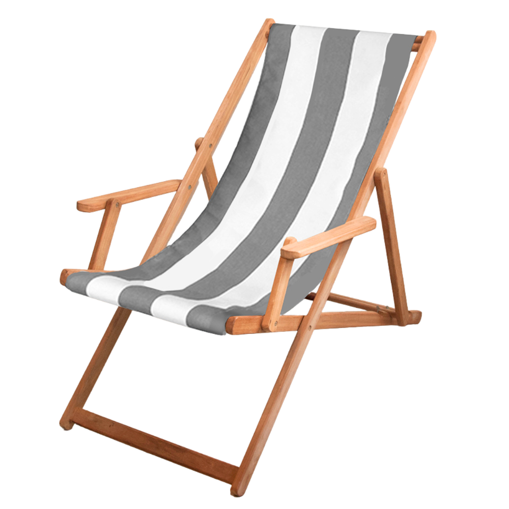 A teak wood deck chair with arms, featuring a waterproof light grey and white block stripe fabric sling by Sunbrella