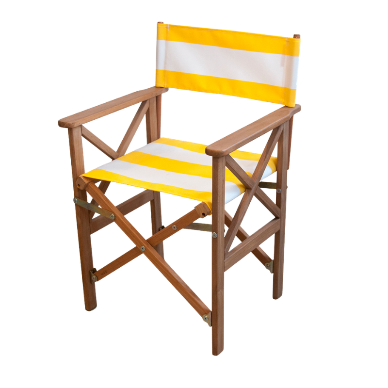 A foldaway director's chair with a teak frame and yellow and white acrylic waterproof Sunbrella fabric sling.