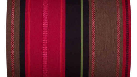 Cotton fabric roll featuring richly detailed stripes of deep red, fuchsia pink, dark navy, mauve and coral, with fine woven accent lines of lavender and lime green throughout.