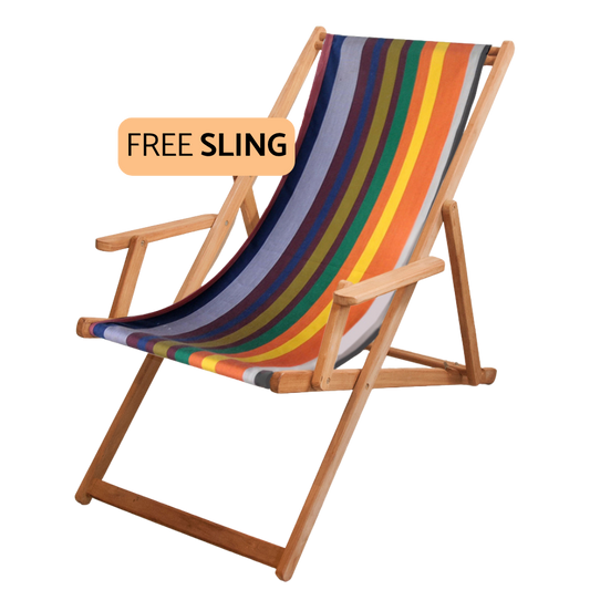 A wooden folding beach chair with a colorful striped sling seat and backrest, shown on a plain white background with an orange badge that reads 'FREE SLING'.