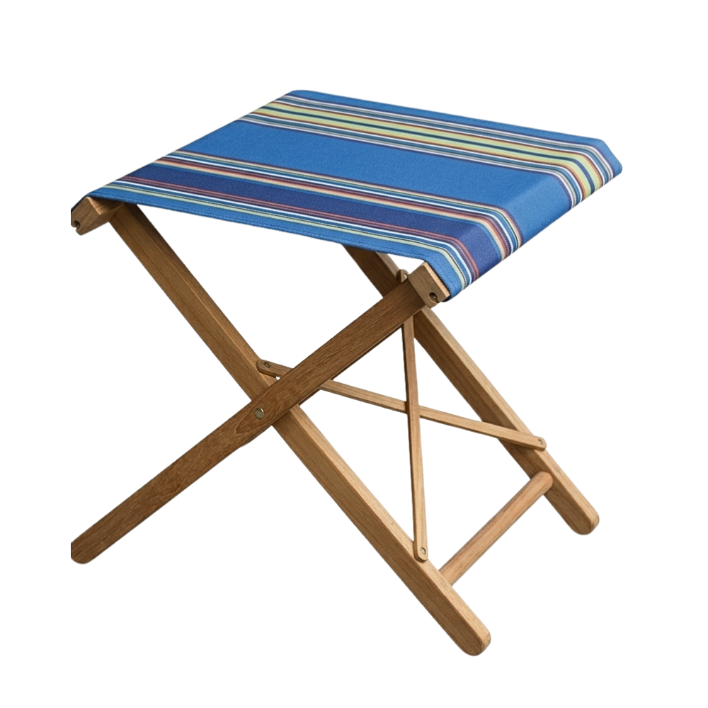 teak wooden folding stool with multi-coloured striped outdoor fabric. Featuring blues, light green, beige, and orange. On a plain background.