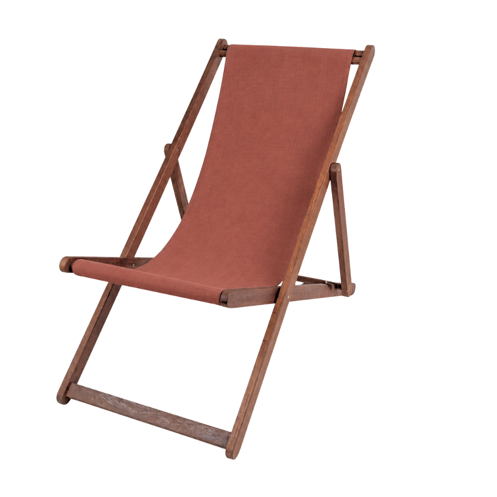 Ici et la hardwood folding deckchair with a terracotta waterproof sunbrella fabric. On white background