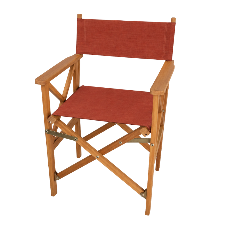 Rich Terracotta coloured Sunbrella directors chairs sling on a teak wooden directors chair frame. On a plain background