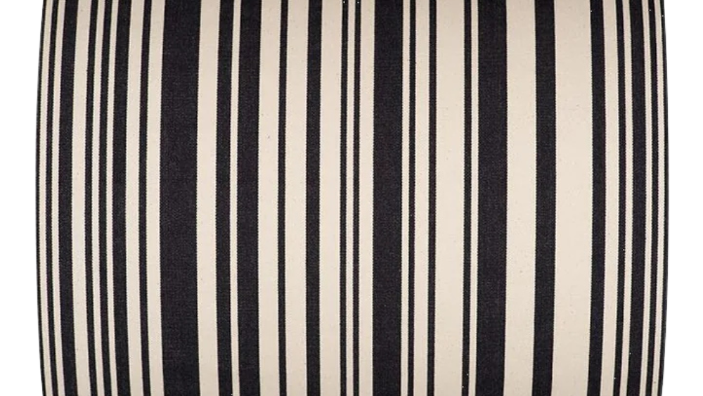 Close up of fabric with black and off white stripes. Like a barcode