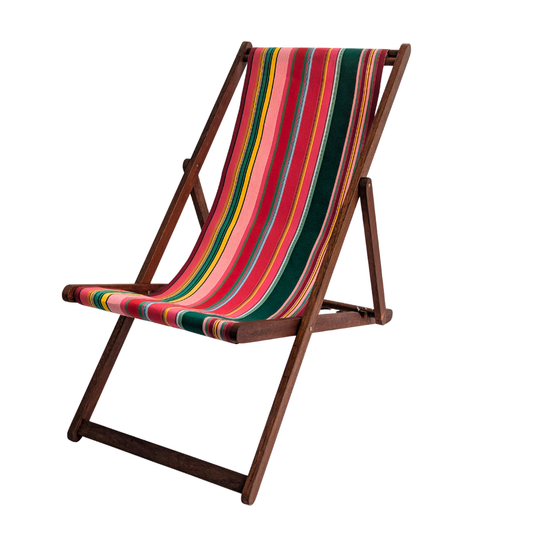 Hardwood deckchair with cotton fabric featuring stripes of red, purplish crimson, candy pink, green, blue and golden yellow, inspired by the colours of the Catalan town of Toulouges and its famous onion.