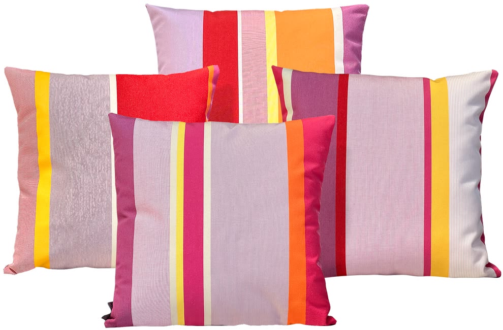 A selection of cushions made from Zinnia Les Toiles du Soleil Outdoor Sunbrella Fabric. Multi striped with rose, pinks, reds and yellows